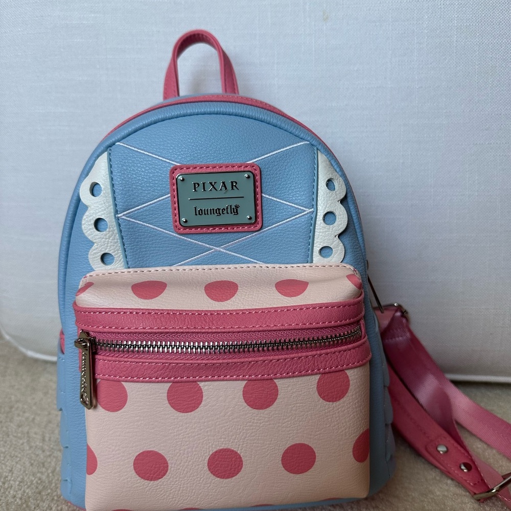 Loungefly Pixar Blue and Pink Polka Dot Backpack